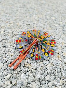 African hand held fan